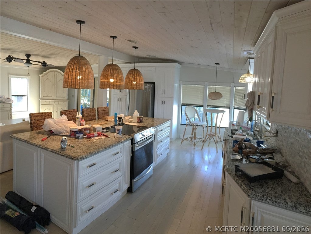 Photo of 14383 SW Rake Drive DR #E-22, Indiantown, FL 34956 (MLS # M20056881)