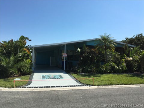 Photo of 14383 SW Rake Drive DR #E-22, Indiantown, FL 34956 (MLS # M20056881)