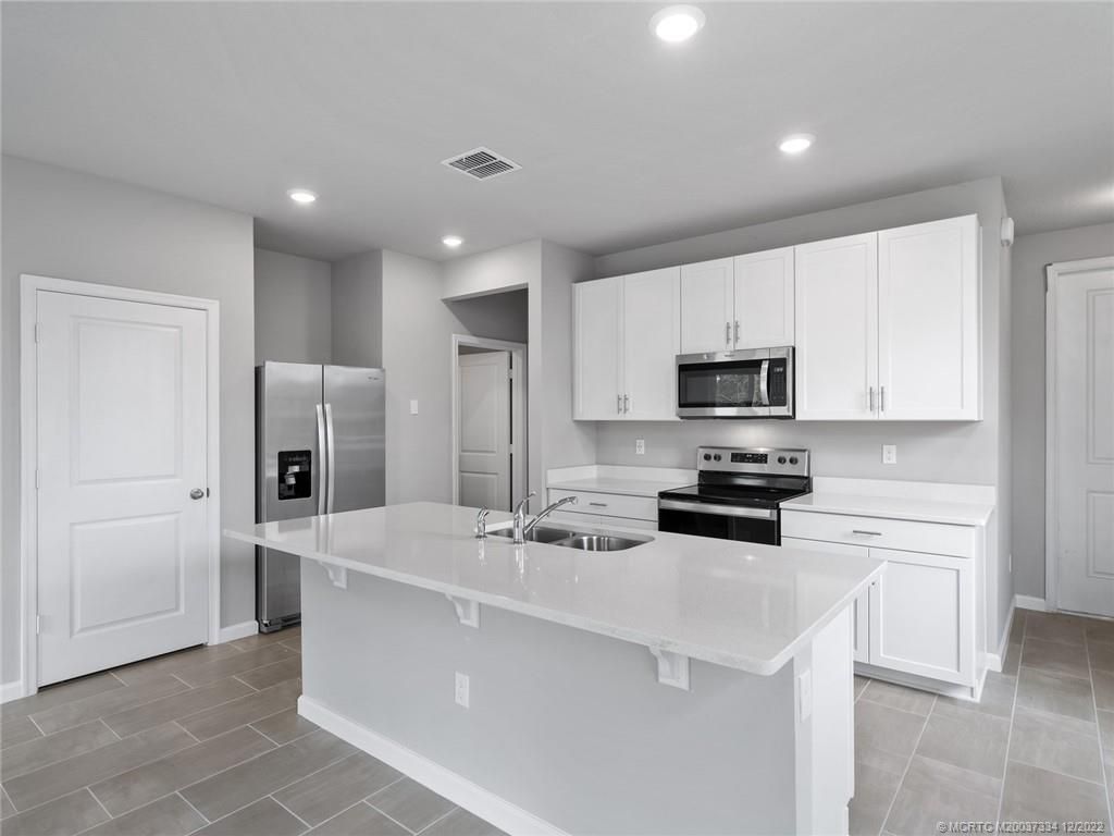 Photo of 238 Osprey Preserve Boulevard, Jensen Beach, FL 34957 (MLS # M20037334)