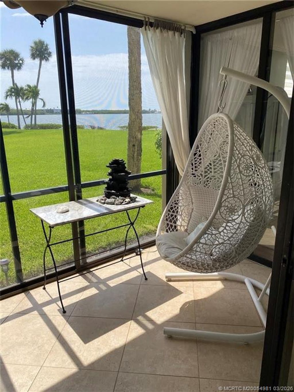 Photo of 3432 NE Causeway Boulevard #102, Jensen Beach, FL 34957 (MLS # M20054981)