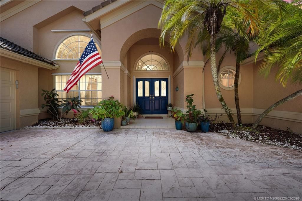 Photo of 1306 SW Cottonwood Cove, Port Saint Lucie, FL 34986 (MLS # M20052226)