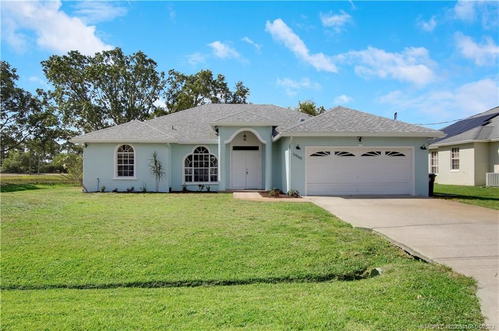 Photo of 5960 NW Theda Lane, Port Saint Lucie, FL 34983 (MLS # M20038164)