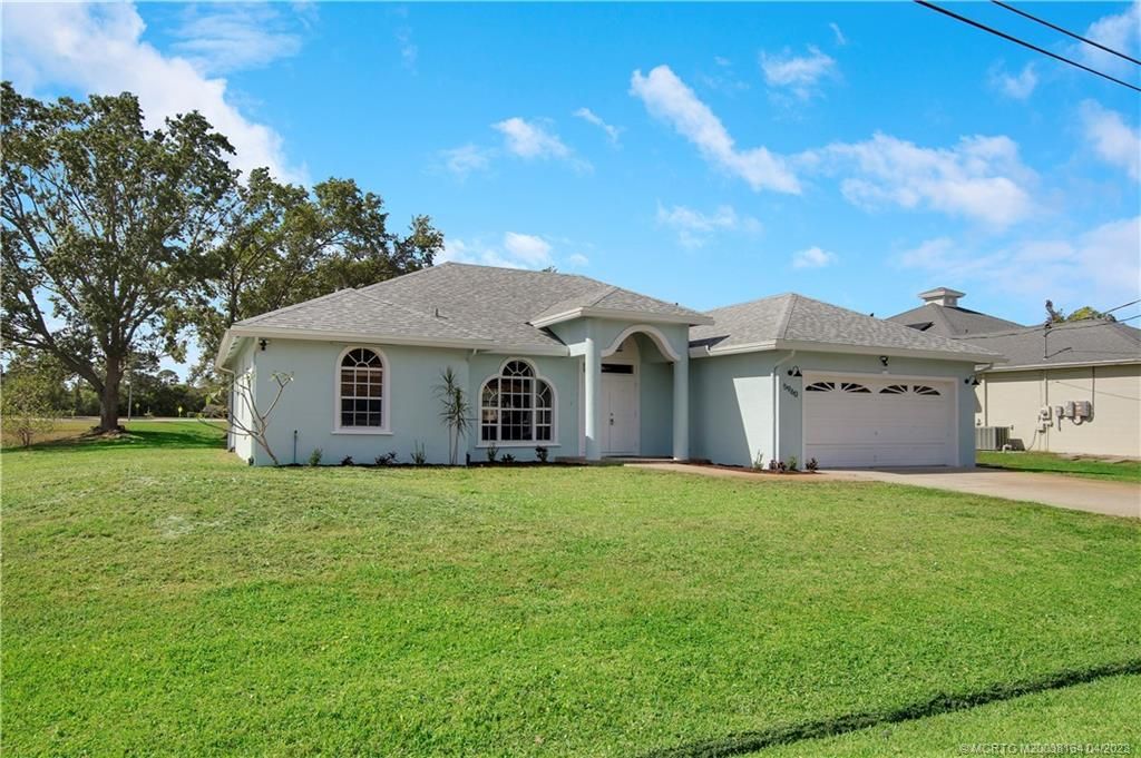 Photo of 5960 NW Theda Lane, Port Saint Lucie, FL 34983 (MLS # M20038164)