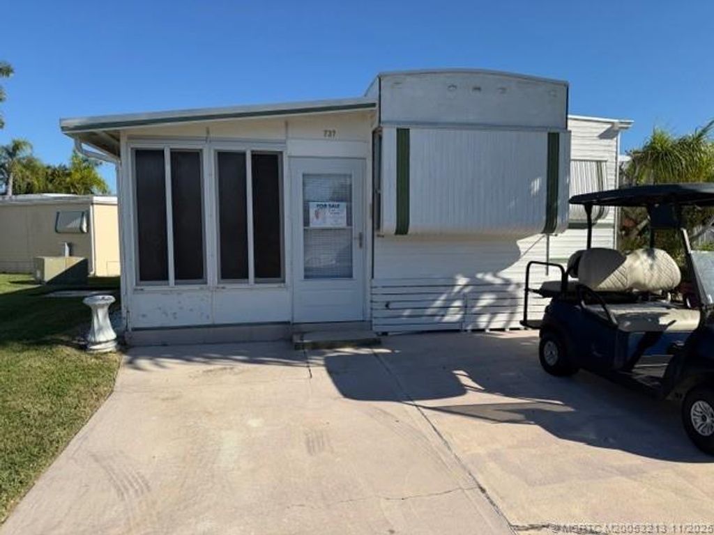 Photo of 737 Nettles Boulevard, Jensen Beach, FL 34957 (MLS # M20053213)