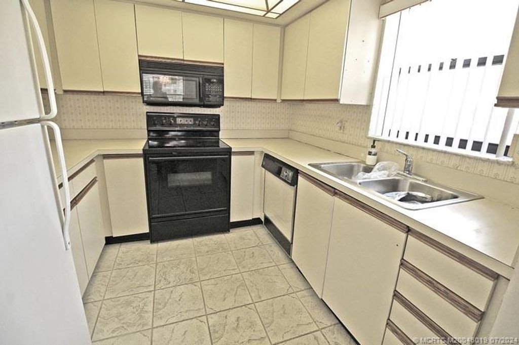 Photo of 211 SW South River Drive #101, Stuart, FL 34997 (MLS # M20046019)