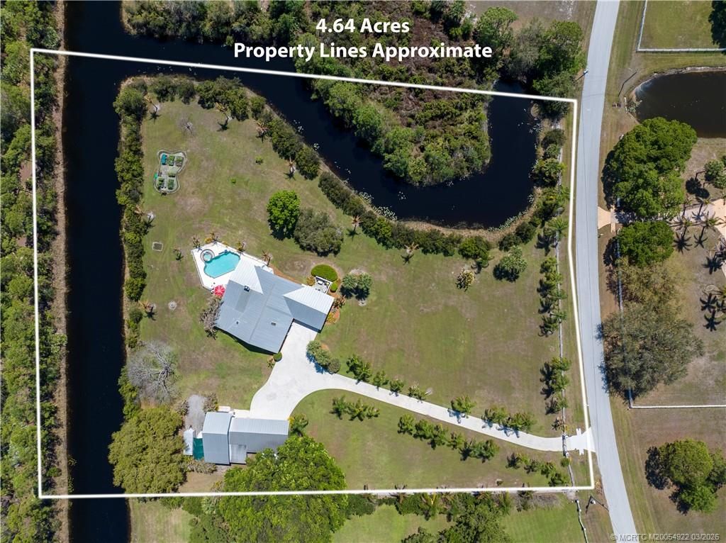 Photo of 9812 SW Santa Monica Drive, Palm City, FL 34990 (MLS # M20054922)