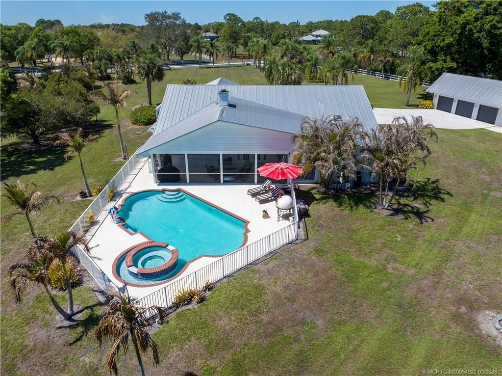 Photo of 9812 SW Santa Monica Drive, Palm City, FL 34990 (MLS # M20054922)