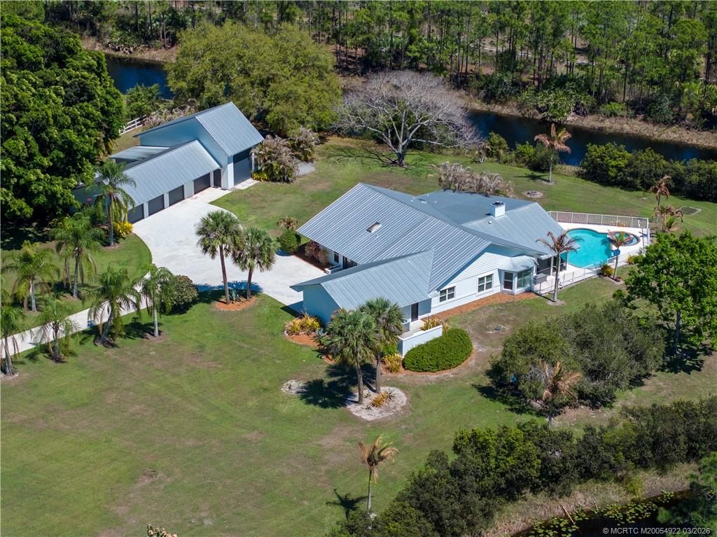 Photo of 9812 SW Santa Monica Drive, Palm City, FL 34990 (MLS # M20054922)