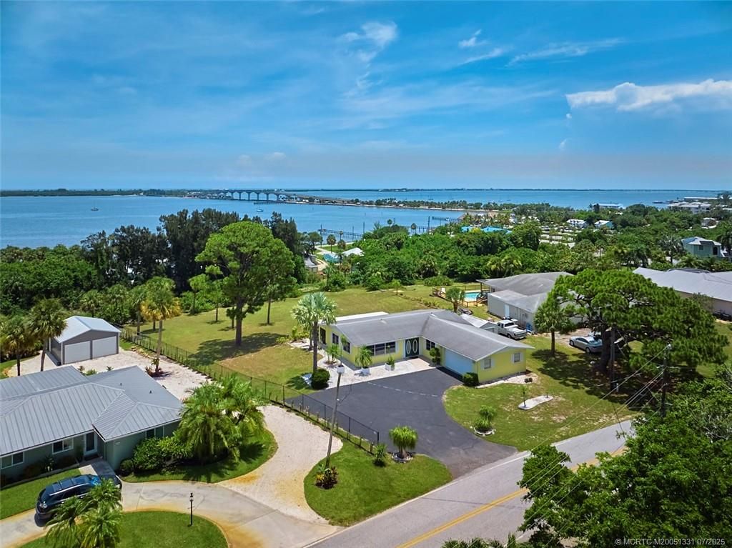 Photo of 4133 NE Skyline Drive, Jensen Beach, FL 34957 (MLS # M20051331)