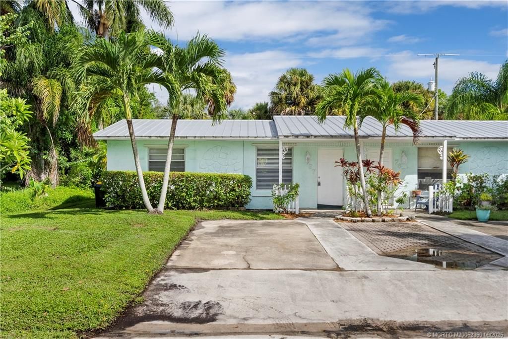 Photo of 797 SW 36th Terrace, Palm City, FL 34990 (MLS # M20052360)