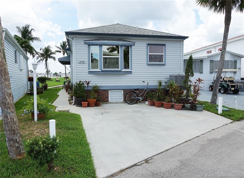 Photo of 2178 Nettles Boulevard, Jensen Beach, FL 34957 (MLS # M20040431)