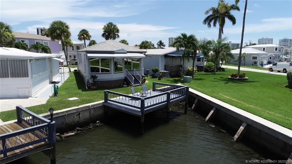 Photo of 2178 Nettles Boulevard, Jensen Beach, FL 34957 (MLS # M20040431)