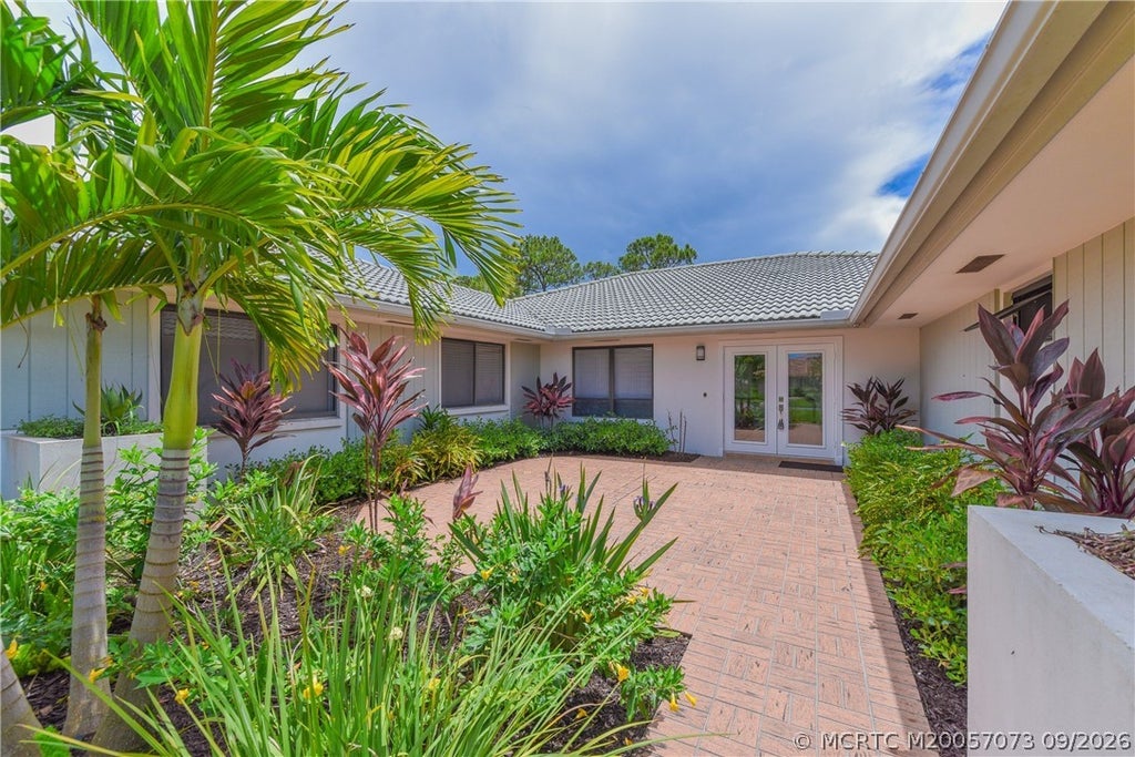 Photo of 1463 SW Troon Circle, Palm City, FL 34990 (MLS # M20057073)