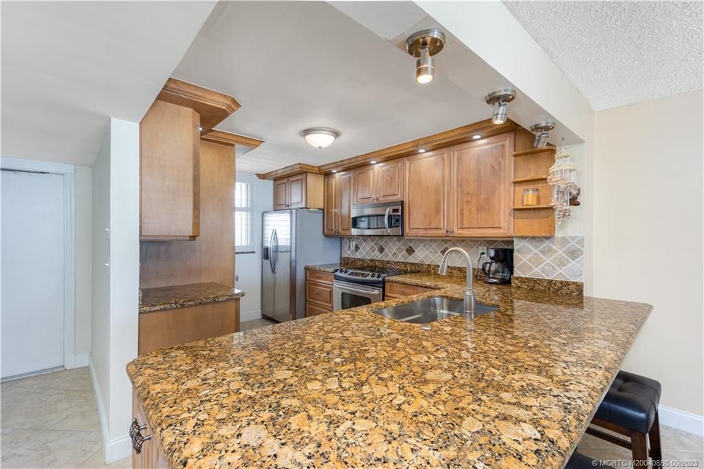 Photo of 9900 S Ocean Drive #1203, Jensen Beach, FL 34957 (MLS # M20040850)