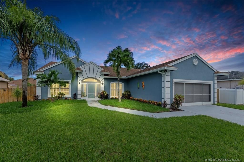 Photo of 2981 SW Sandbar Street, Port Saint Lucie, FL 34953 (MLS # M20046622)