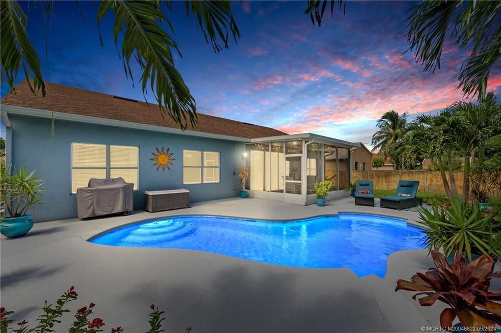 Photo of 2981 SW Sandbar Street, Port Saint Lucie, FL 34953 (MLS # M20046622)