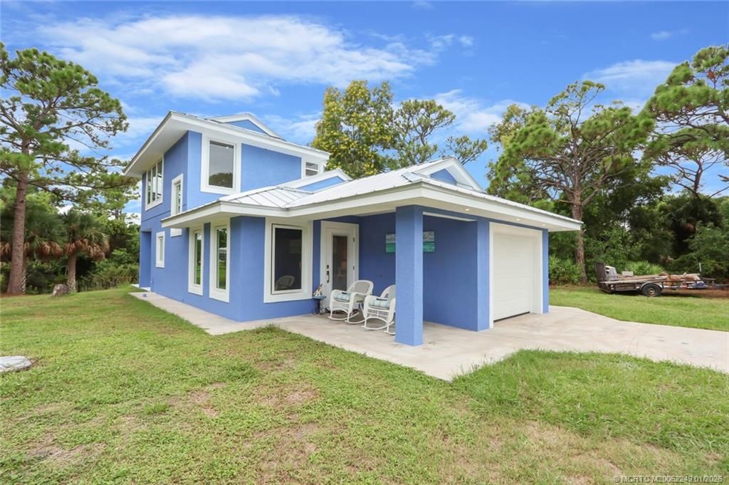 Photo of 64 NE Acacia Trail, Jensen Beach, FL 34957 (MLS # M20052249)