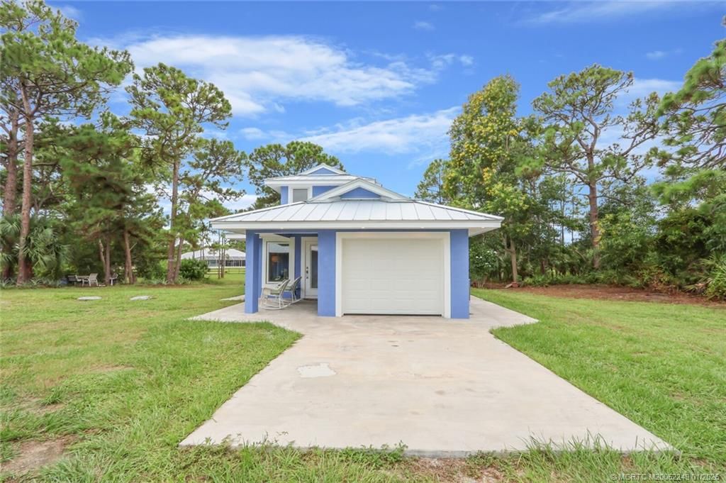 Photo of 64 NE Acacia Trail, Jensen Beach, FL 34957 (MLS # M20052249)