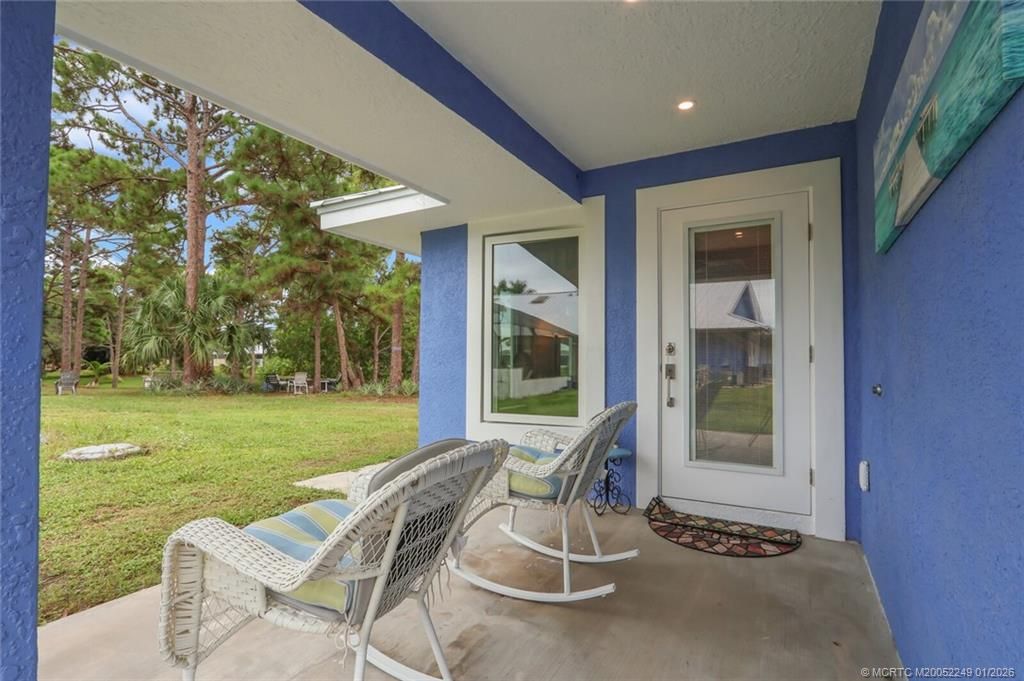 Photo of 64 NE Acacia Trail, Jensen Beach, FL 34957 (MLS # M20052249)