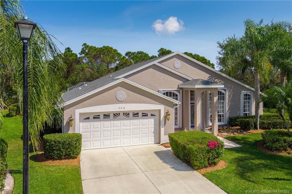 Photo of 376 NW Canna Way, Jensen Beach, FL 34957 (MLS # M20040154)