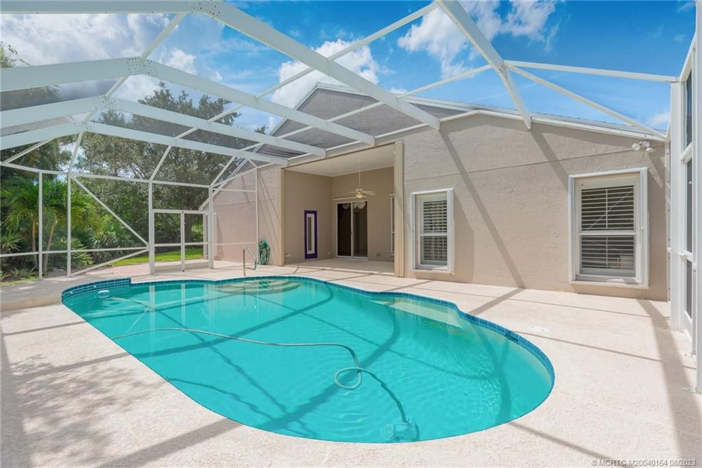 Photo of 376 NW Canna Way, Jensen Beach, FL 34957 (MLS # M20040154)