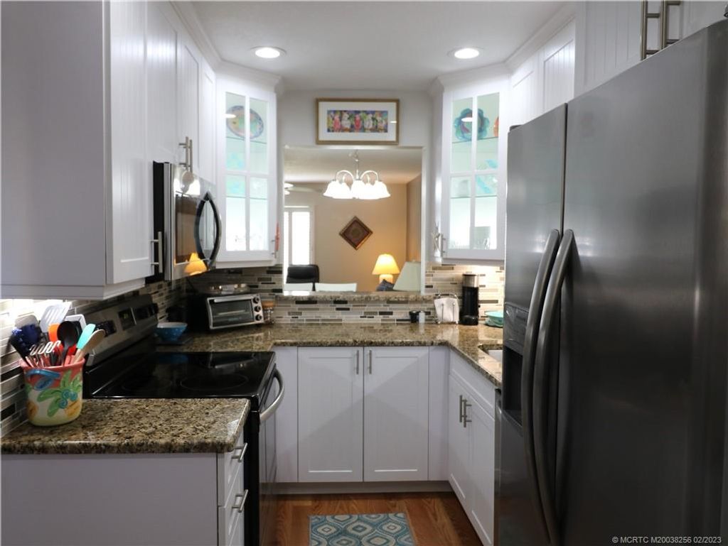 Photo of 5323 SE Miles Grant Road SE #J103, Stuart, FL 34997 (MLS # M20038256)