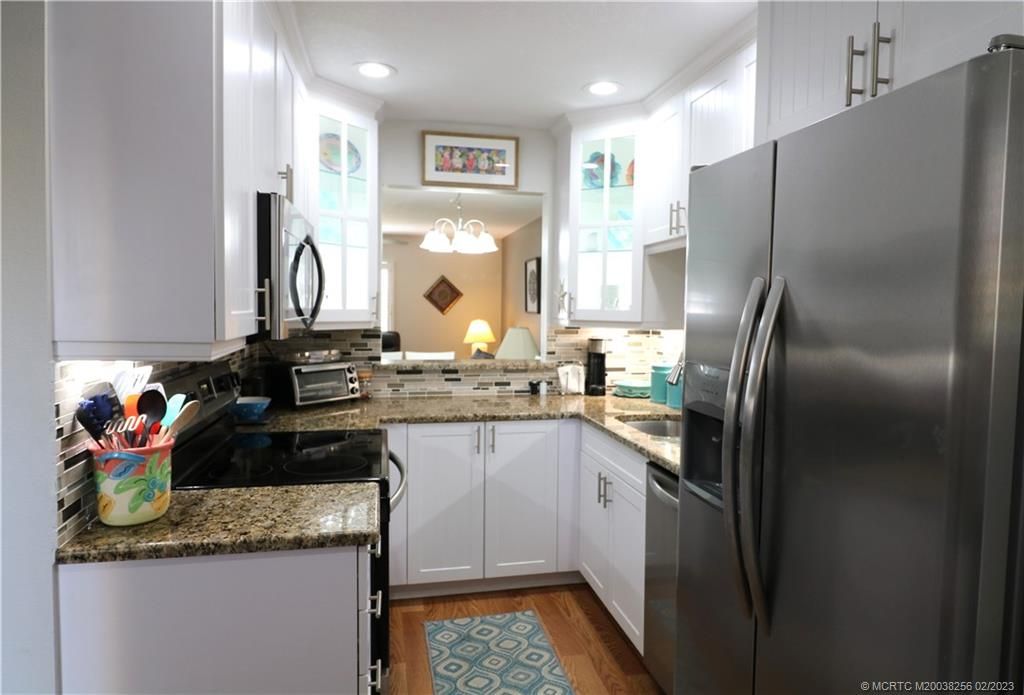 Photo of 5323 SE Miles Grant Road SE #J103, Stuart, FL 34997 (MLS # M20038256)