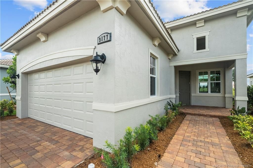 Photo of 9177 SW Pepoli Way, Port Saint Lucie, FL 34987 (MLS # M20038981)