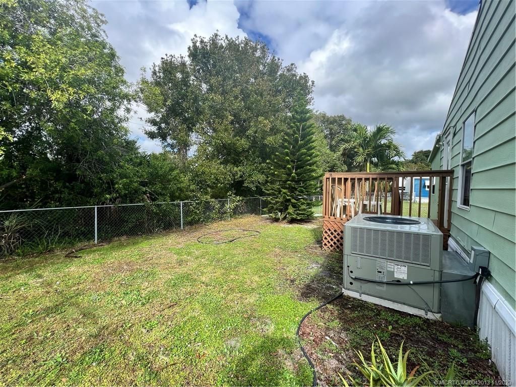 Photo of 8451 Florence Drive, Port Saint Lucie, FL 34952 (MLS # M20042013)