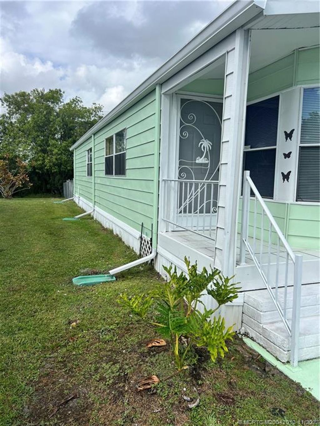 Photo of 8451 Florence Drive, Port Saint Lucie, FL 34952 (MLS # M20042013)