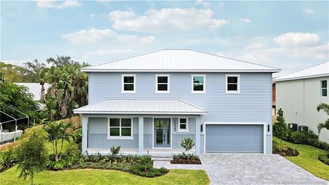 Photo of 1023 NE Orange Avenue, Jensen Beach, FL 34957 (MLS # M20052035)