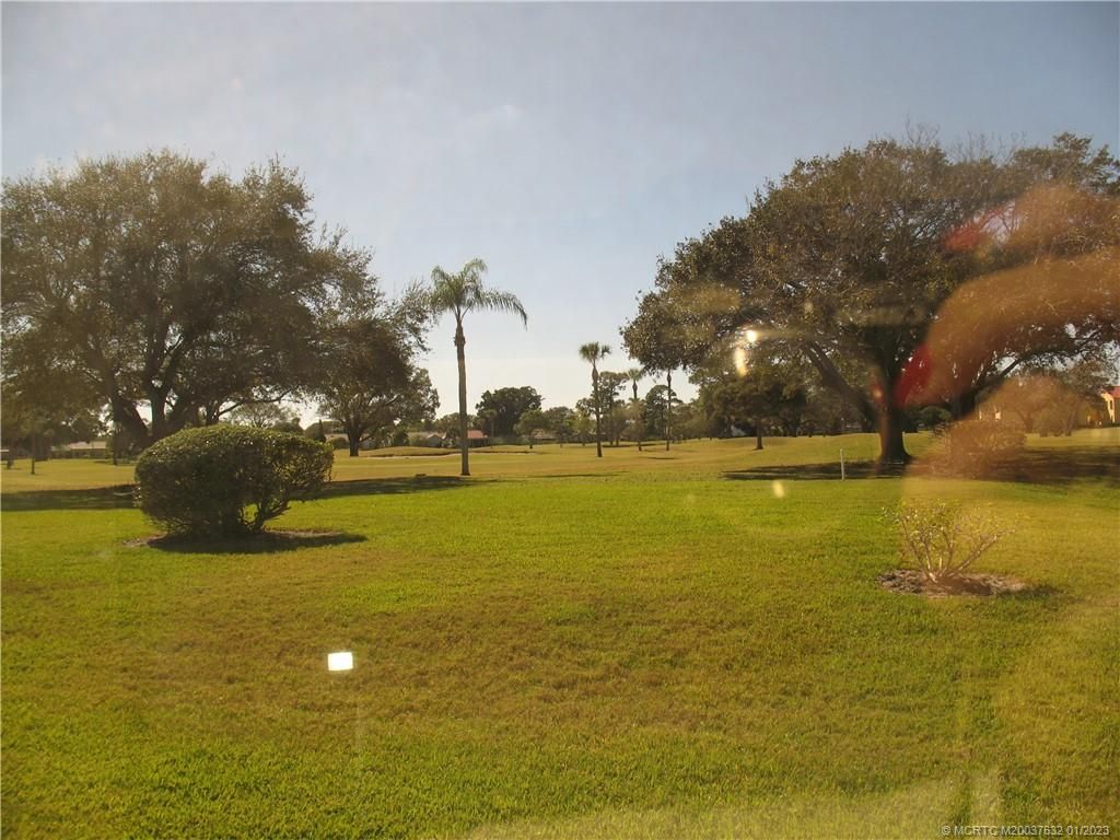 Photo of 5433 SE Miles Grant Road #E105, Stuart, FL 34997 (MLS # M20037632)