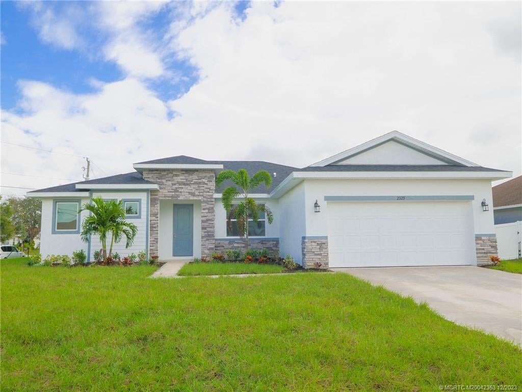 Photo of 2329 SW Alminar Street, Port Saint Lucie, FL 34953 (MLS # M20042353)