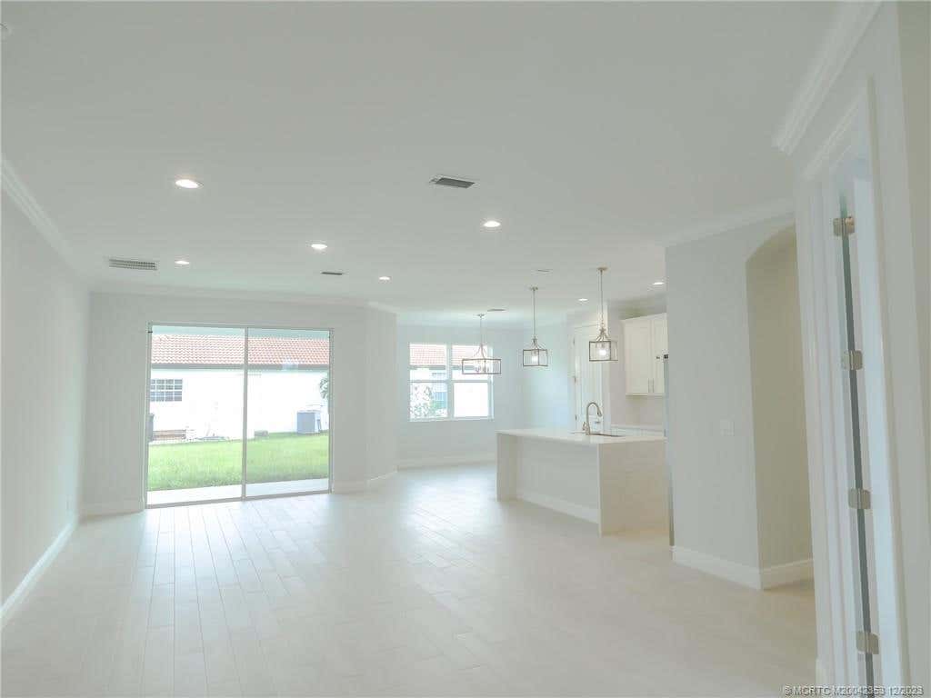 Photo of 2329 SW Alminar Street, Port Saint Lucie, FL 34953 (MLS # M20042353)