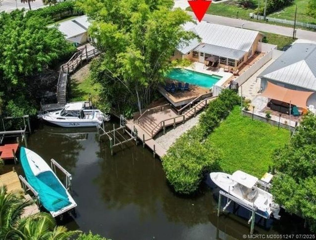 Photo of 1469 SW Covered Bridge Drive, Palm City, FL 34990 (MLS # M20051247)