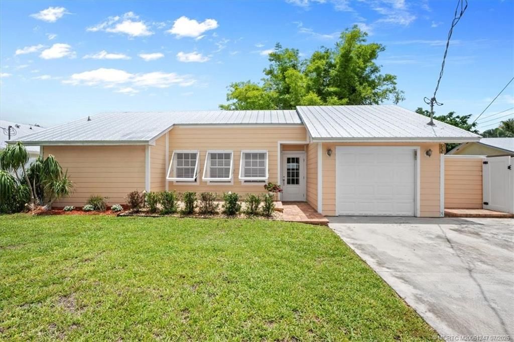 Photo of 1469 SW Covered Bridge Drive, Palm City, FL 34990 (MLS # M20051247)