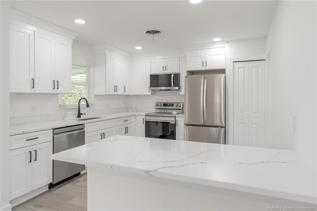 Photo of 1030 SE Dolphin Drive, Stuart, FL 34996 (MLS # M20051623)