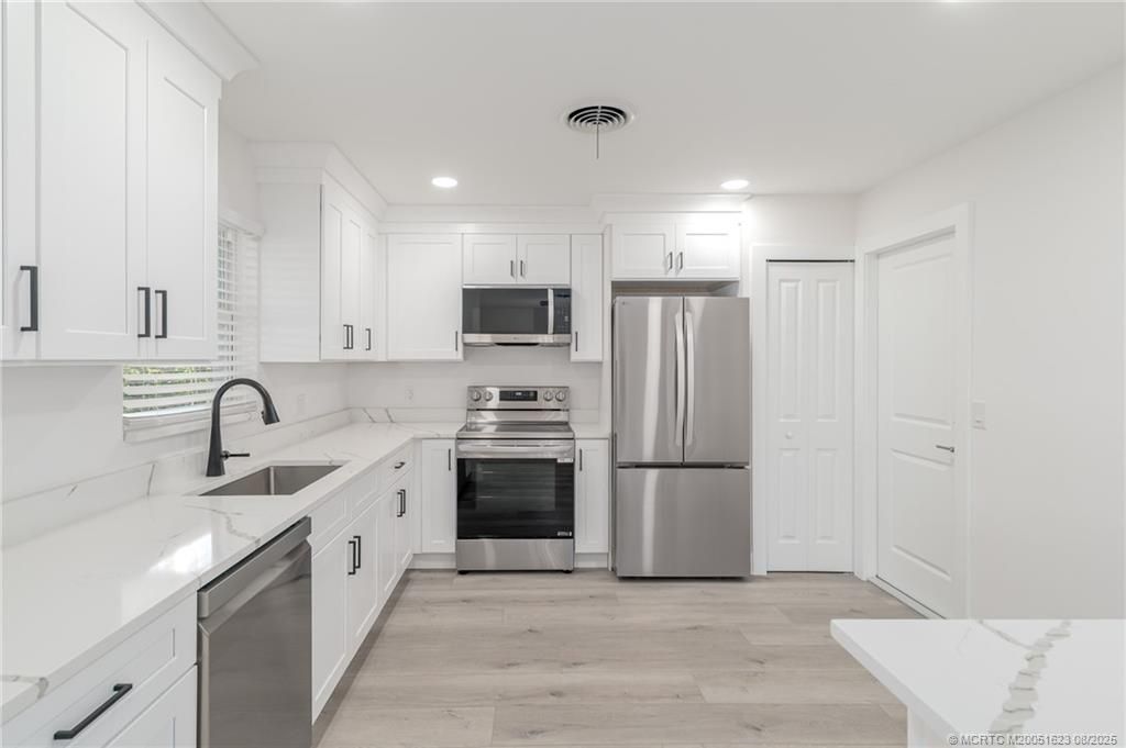 Photo of 1030 SE Dolphin Drive, Stuart, FL 34996 (MLS # M20051623)