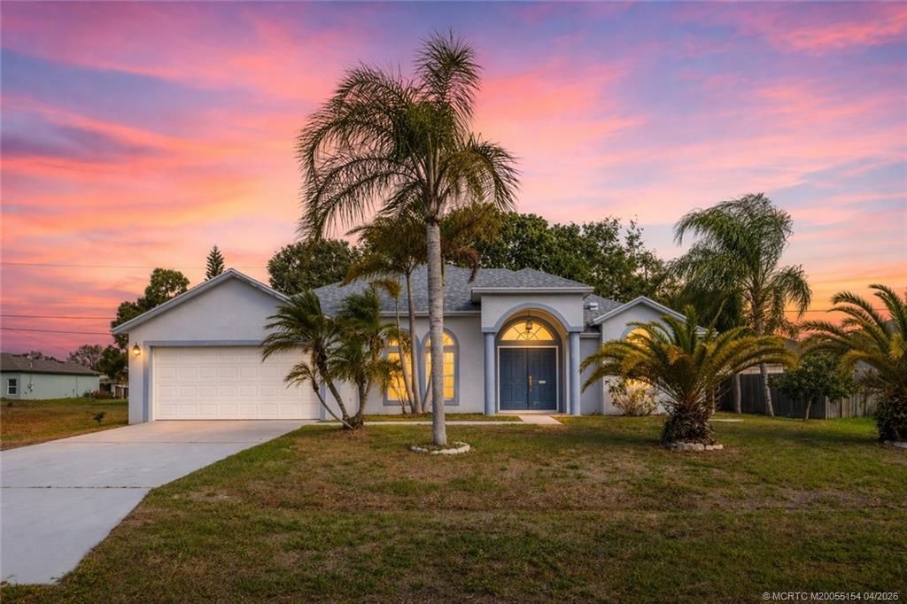 Photo of 409 SW Prater Avenue, Port Saint Lucie, FL 34953 (MLS # M20055154)