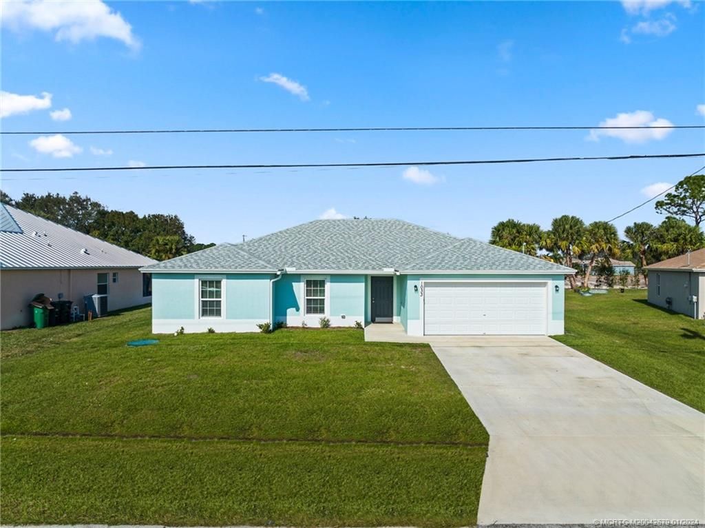Photo of 1033 SW Ingrassina Avenue, Port Saint Lucie, FL 34953 (MLS # M20042679)