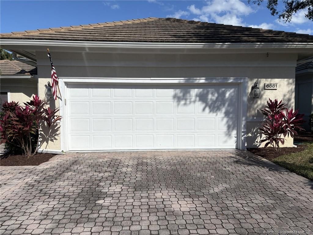 Photo of 6881 SE Pacific Drive, Stuart, FL 34997 (MLS # M20048674)