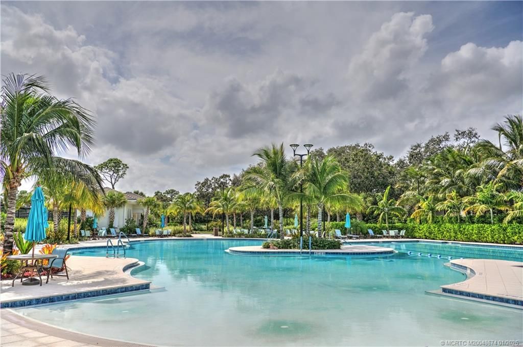 Photo of 6881 SE Pacific Drive, Stuart, FL 34997 (MLS # M20048674)