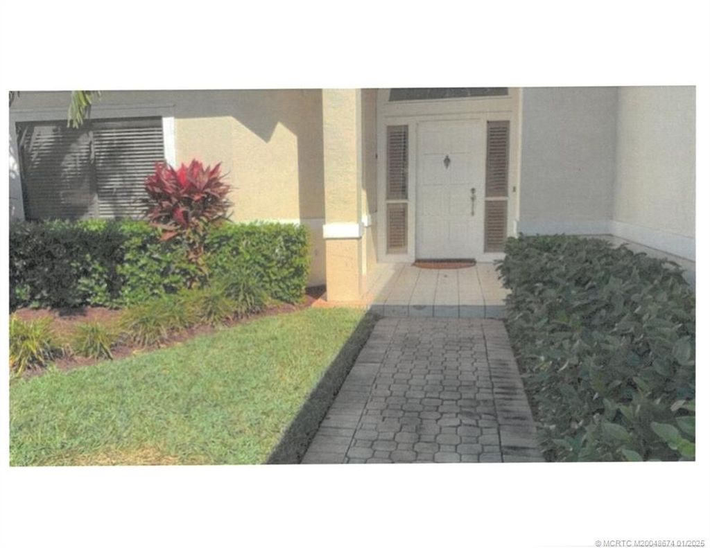 Photo of 6881 SE Pacific Drive, Stuart, FL 34997 (MLS # M20048674)