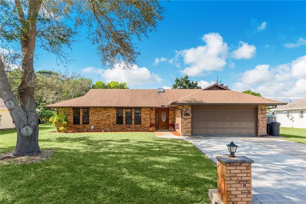 Photo of 2082 SE Camilo Street, Port Saint Lucie, FL 34952 (MLS # M20037944)