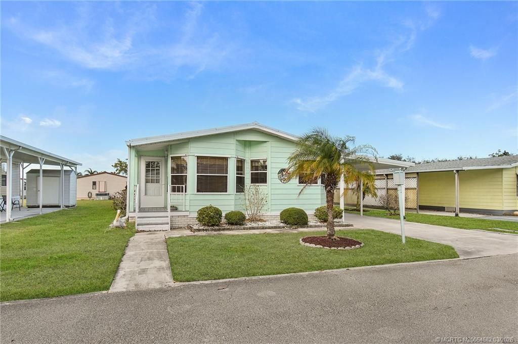 Photo of 8636 Florence Drive, Port Saint Lucie, FL 34952 (MLS # M20054682)