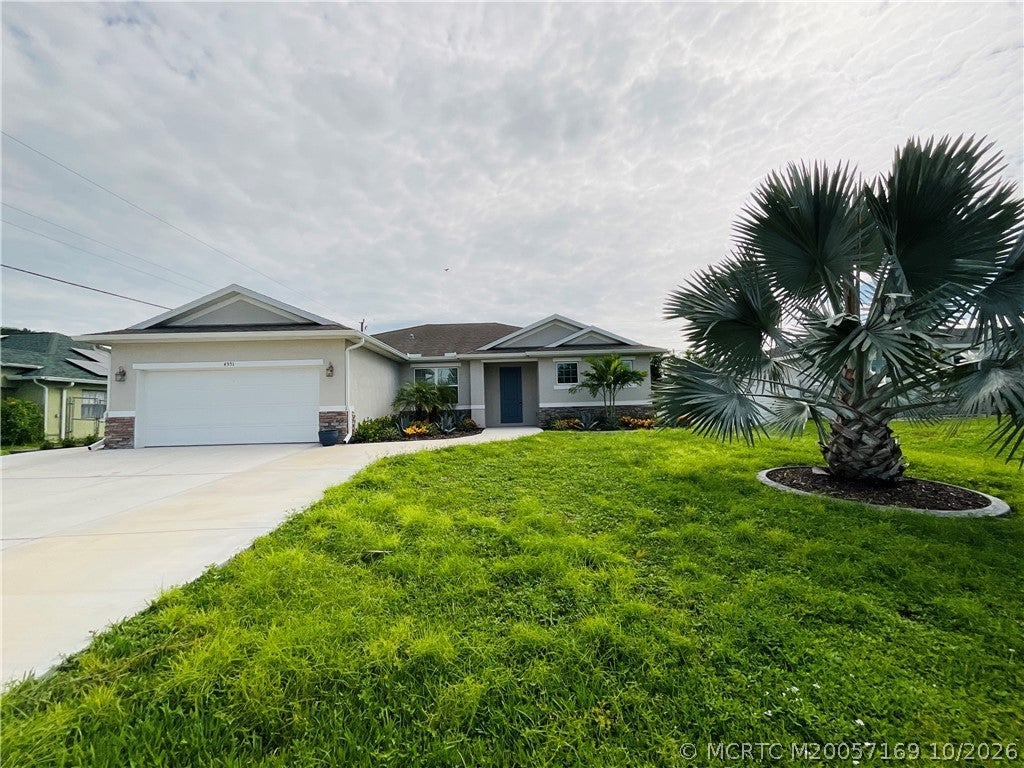 Photo of 4551 SW Masefield Street, Port Saint Lucie, FL 34953 (MLS # M20057169)