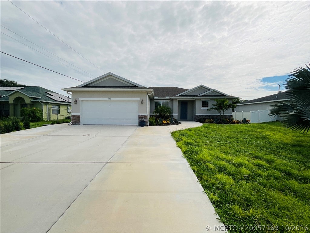 Photo of 4551 SW Masefield Street, Port Saint Lucie, FL 34953 (MLS # M20057169)