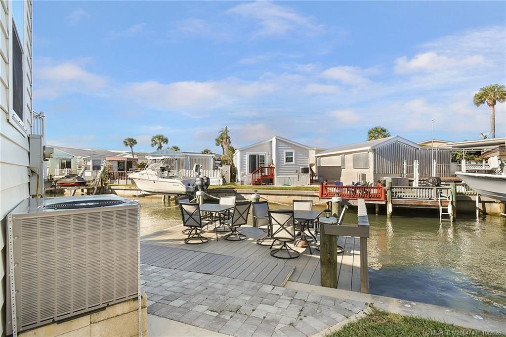 Photo of 1092 Nettles Boulevard, Jensen Beach, FL 34957 (MLS # M20047401)