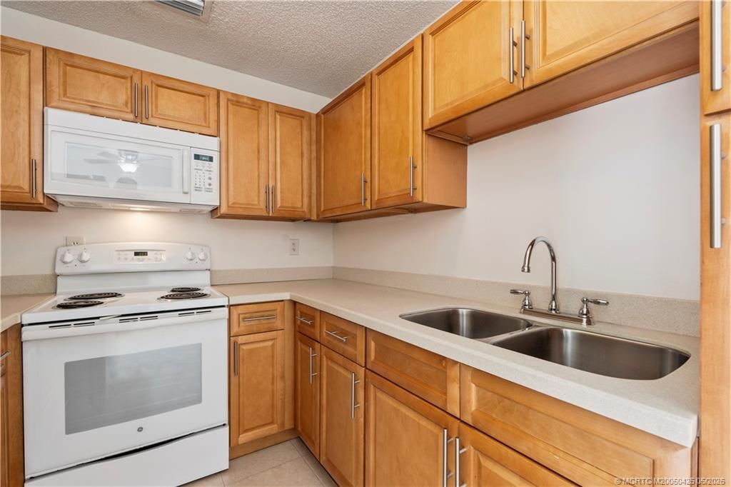 Photo of 5851 SE Wesley Avenue, Stuart, FL 34997 (MLS # M20050425)