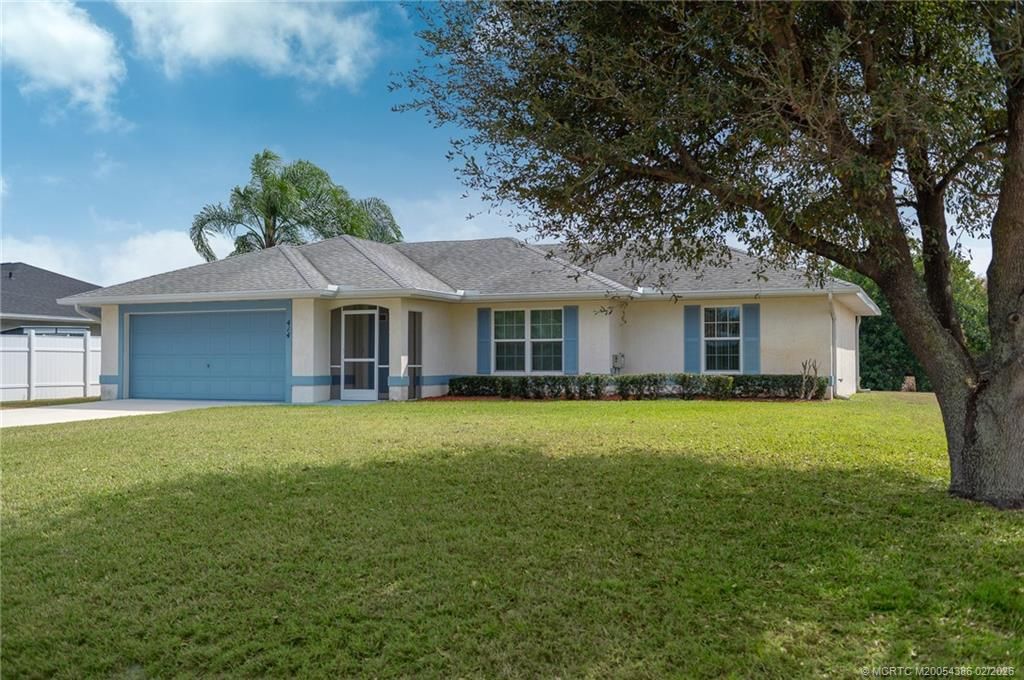 Photo of 414 SW Carter Avenue, Port Saint Lucie, FL 34983 (MLS # M20054386)